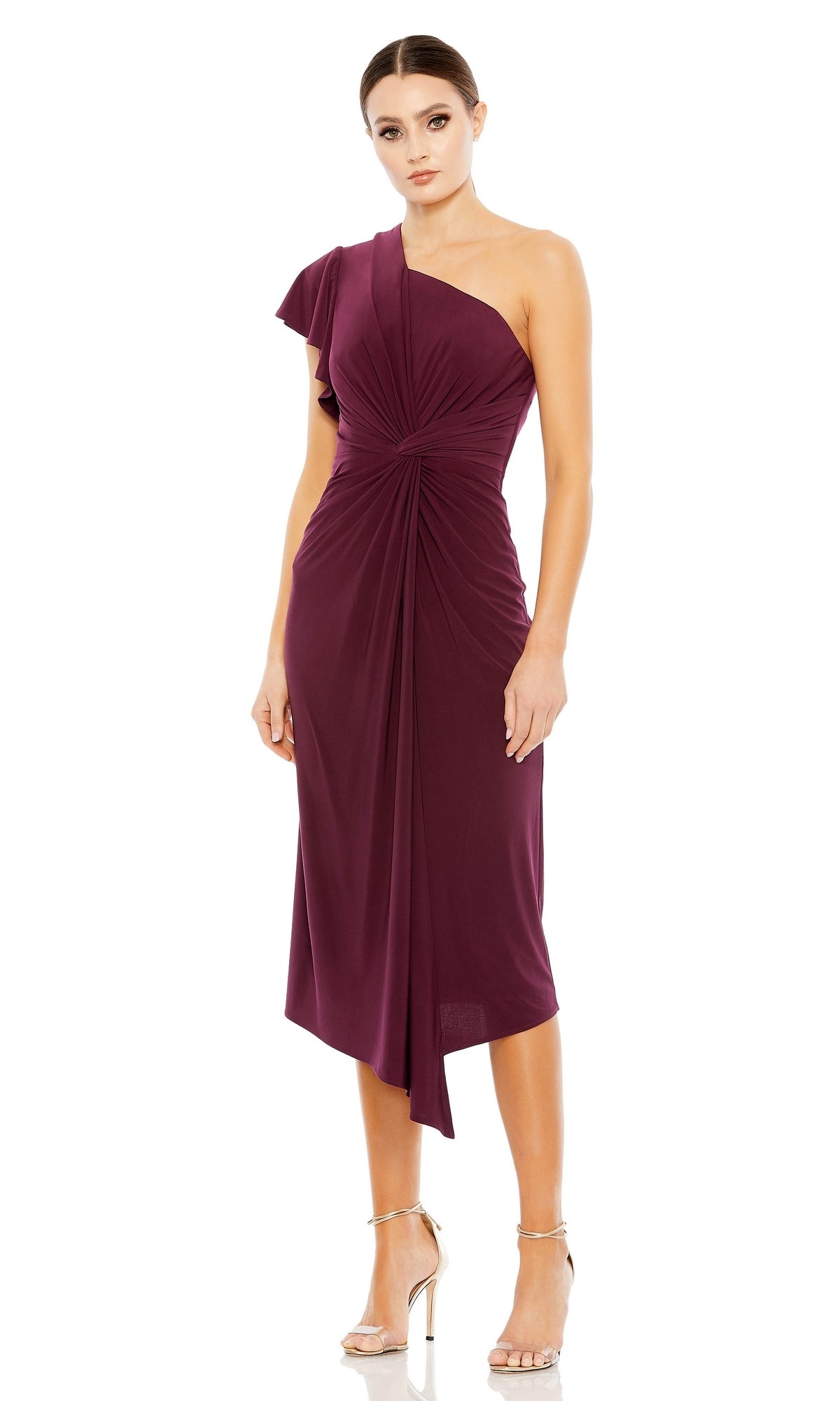 Woman in a sleeveless Mac Duggal One-Shoulder Knot-Waist Midi Party Dress 12480 in burgundy with gathered details and silver heels, standing against a white background.